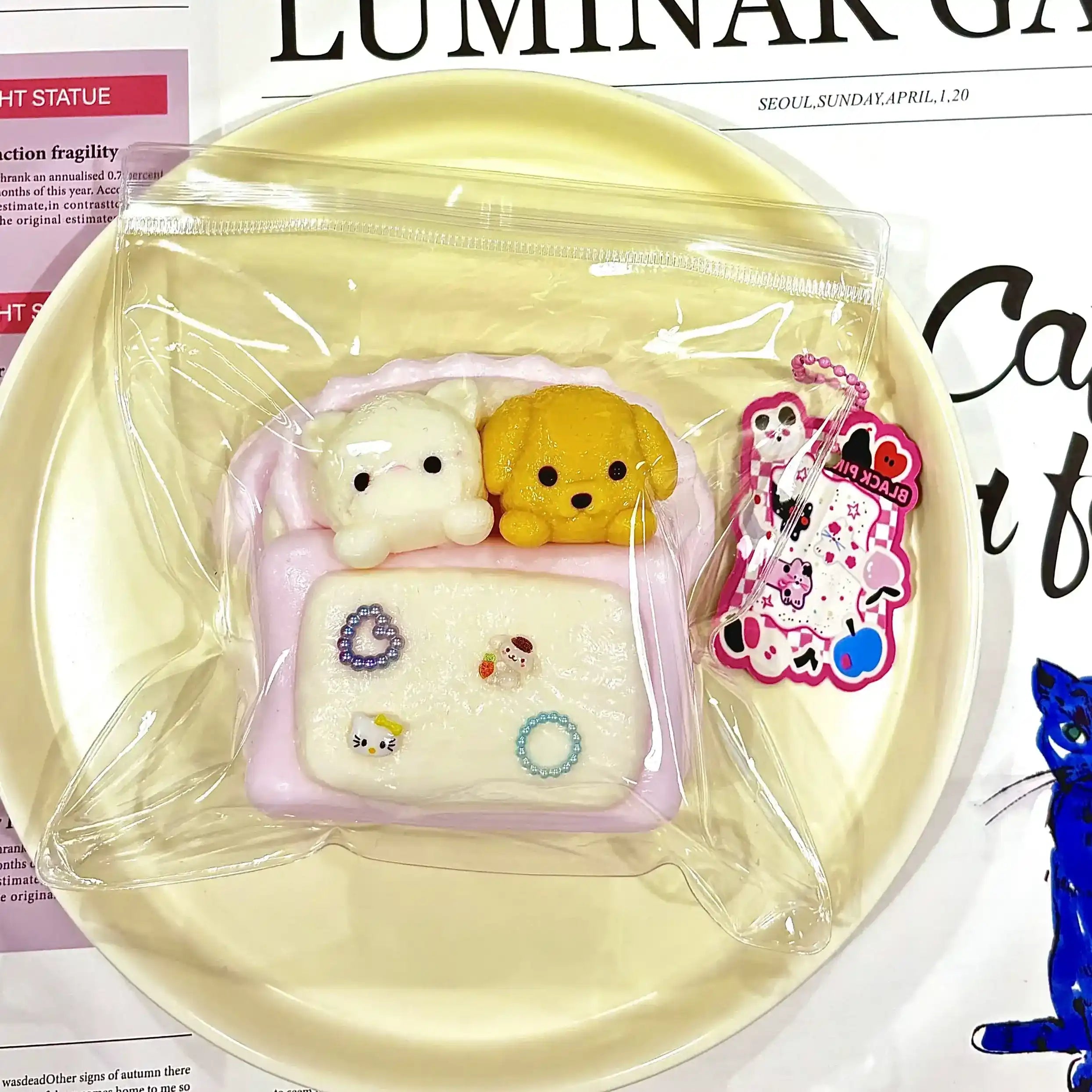 Top view of Gigglesquishy Dreamy Napmates soft squishy pet pair